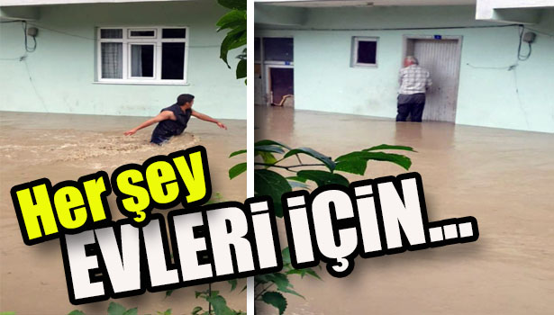BELLERİNE KADAR SUYA GİREREK EŞYALARINI KURTARMAYA ÇALIŞTILAR