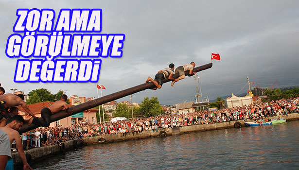 YAĞLI DİREK YARIŞMACILARI SIKI PAZARLIKLA 12 BİN LİRAYI KAPTI