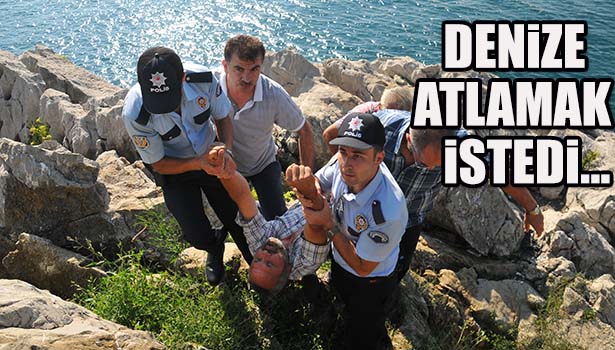 KAYALIKLARDAN DENİZE ATLAMAK İSTEYEN ŞAHSI POLİS KURTARDI