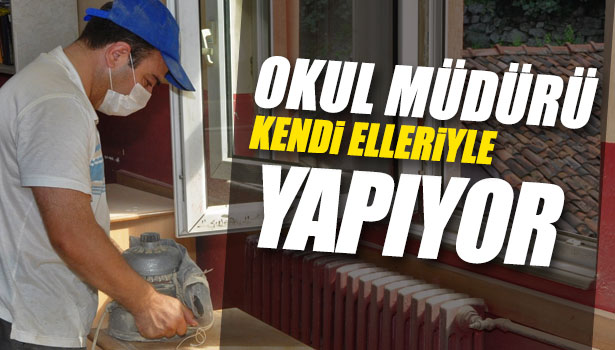 OKUL TADİLATINI MÜDÜR YAPIYOR