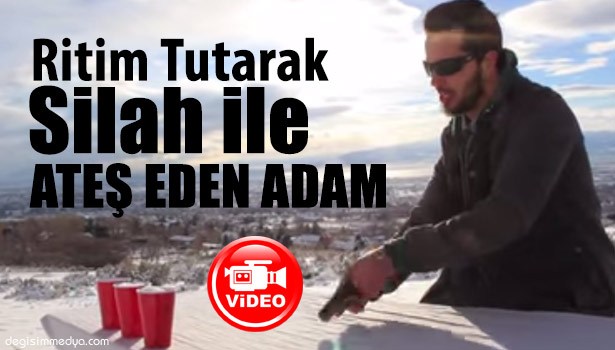 RİTİM TUTARAK SİLAH İLE ATEŞ EDEN ADAM