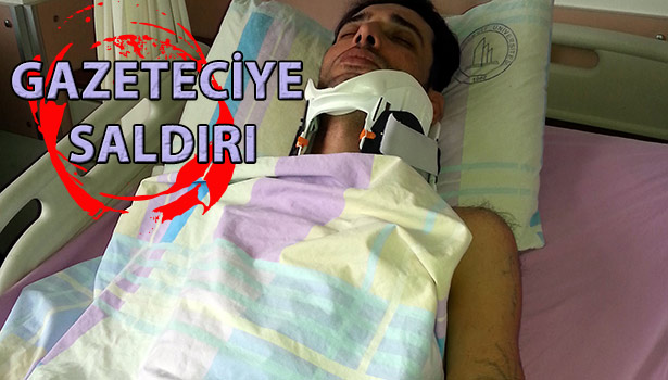 GAZETECİYİ SOPALARLA DÖVDÜLER