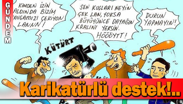 KARİKATÜRİSTTEN SALDIRIYA UĞRAYAN GAZETECİYE DESTEK...