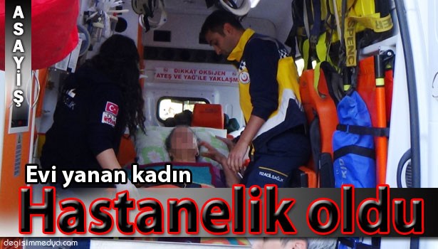 EVİ YANAN KADIN HASTANELİK OLDU