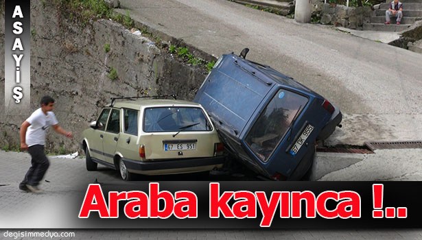 PARK HALİNDEKİ OTOMOBİLİN ÜZERİNE DEVRİLDİ!..