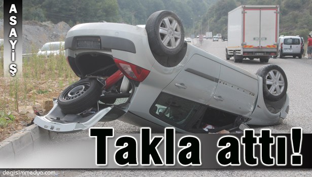 OTOMOBİL TAKLA ATTI: 2 YARALI !..