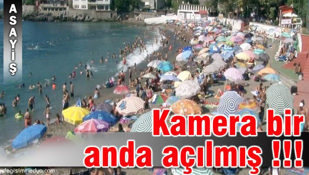 PLAJDA BİKİNİLİ KADINLARIN FOTOĞRAFINI ÇEKERKEN YAKALANDI