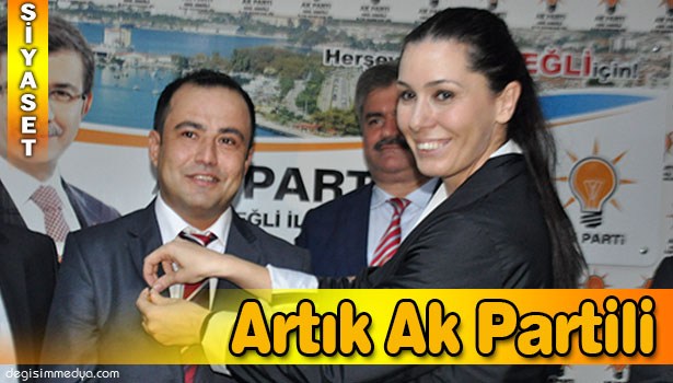 CHP'DEN GEÇEN İL GENEL MECLİSİ ÜYESİNE ROZET TAKTI