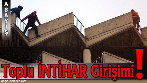 8 KATLI BİNANIN ÇATISINDA TOPLU İNTİHAR GİRİŞİMİ