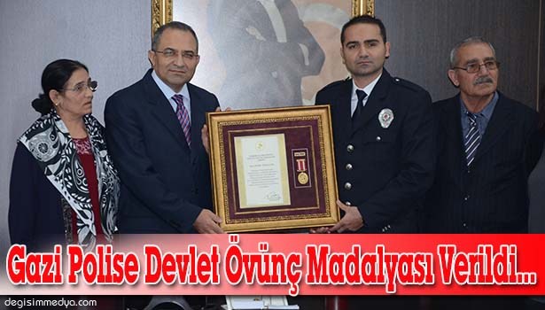 GAZİ POLİSE DEVLET ÖVÜNÇ MADALYASI VERİLDİ