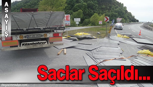 TIR'IN DORSESİNDEN KAYAN SACLAR KARAYOLUNA SAÇILDI