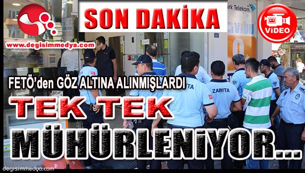 FETÖ'DEN GÖZ ALTINA ALINAN ESNAFLARIN DÜKKANLARI MÜHÜRLENDİ...
