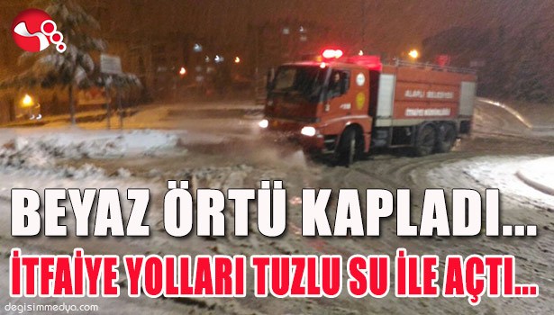 BEYAZ ÖRTÜ KAPLADI... İTFAİYE YOLLARI TUZLU SU İLE AÇTI...