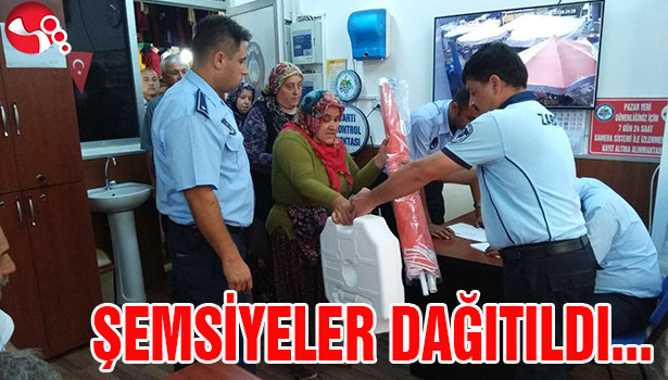 ŞEMSİYELER DAĞITILDI...