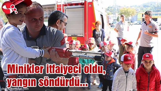 Minikler itfaiyeci oldu, yangın söndürdü...