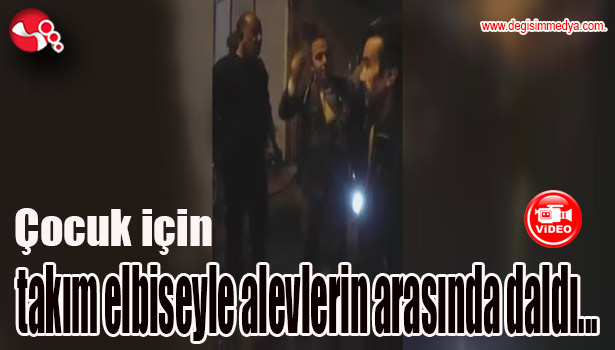 Çocuk için takım elbiseyle alevlerin arasında daldı...