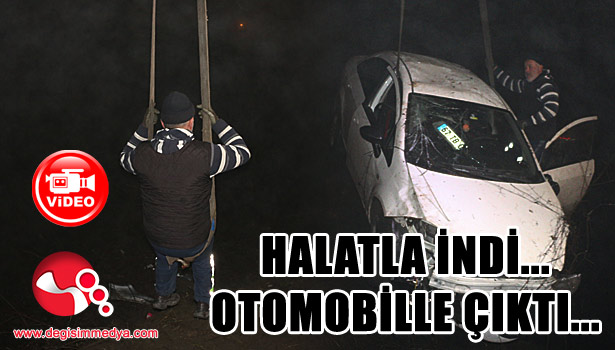 Halatla indi, otomobille çıktı...