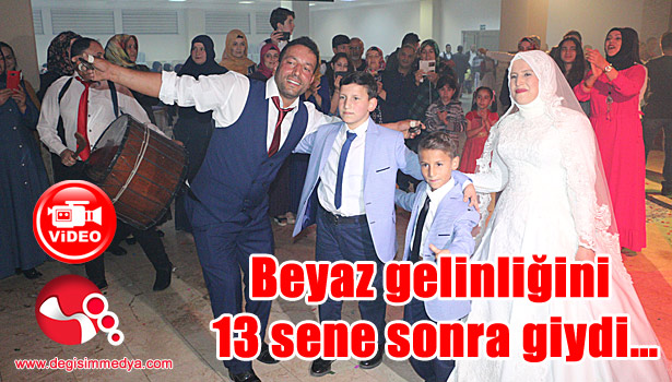 Beyaz gelinliğini 13 sene sonra giydi...