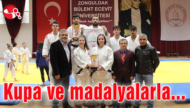 Kupa ve Madalyalarla döndüler...