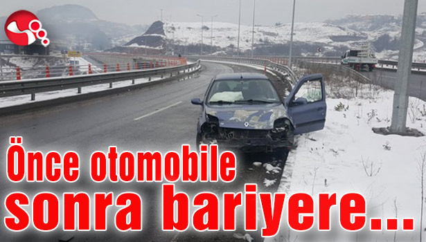 Önce otomobile sonra bariyere...