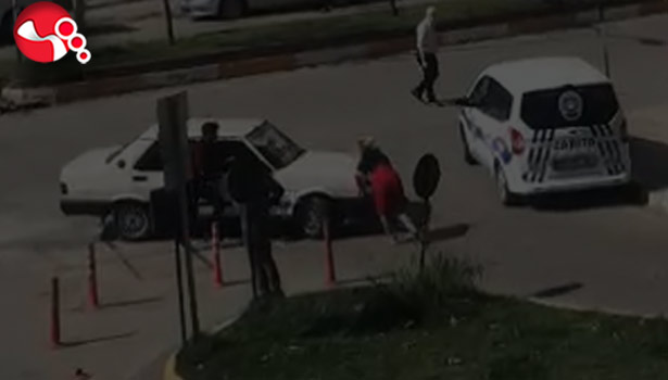 Tartıştığı kadının üzerine otomobilini sürdü