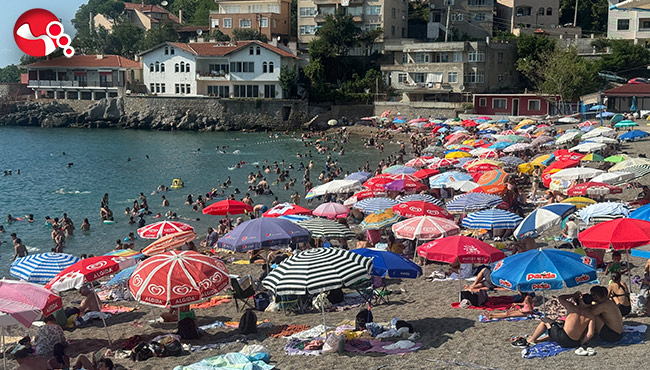 Serinlemek isteyen plaja koştu