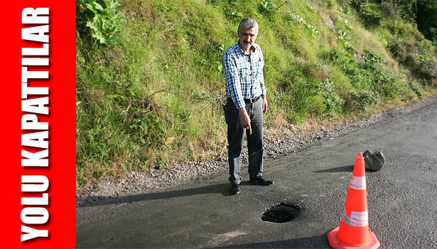 YOLUN ORTASINDA AÇILAN ÇUKUR KARAYOLUNU KAPATTI
