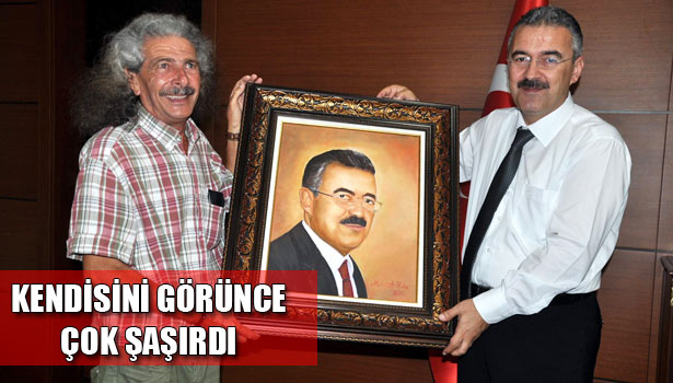 VALİ'YE PORTRESİNİ HEDİYE ETTİ
