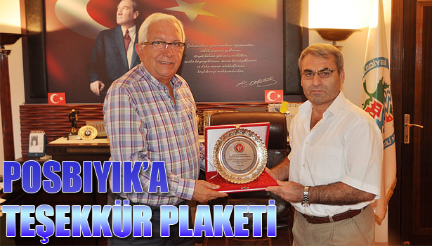 TEAKWONDO FEDERASYONU'NDAN POSBIYIK'A TEŞEKKÜR PLAKETİ