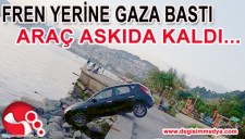 FREN YERİNE GAZA BASTI, ARAÇ ASKIDA KALDI...