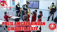 POLİS AMCALARINDAN MİNİKLERE ÇİKOLATA JESTİ