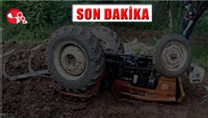 Devrilen traktörün altında can verdi..