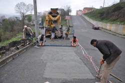 YOLLARIN BOZUK BÖLÜMLERİNE KAPLAMA..